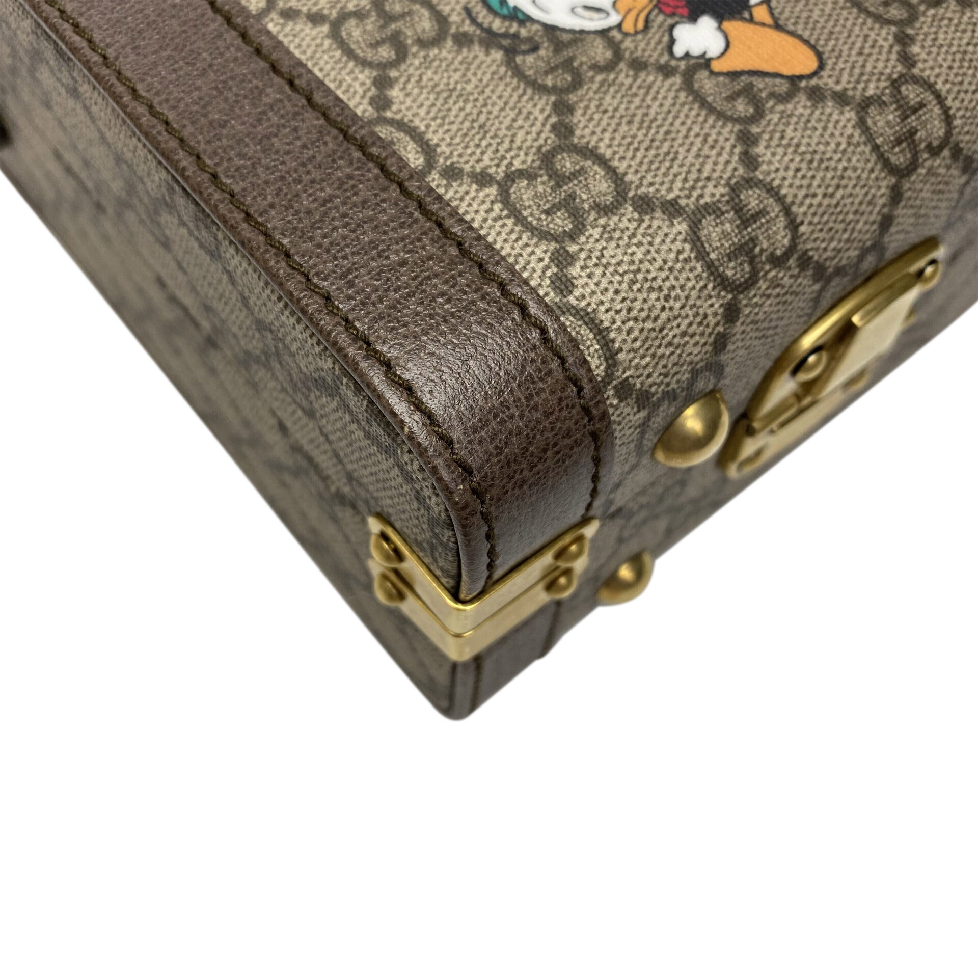Bolsa Gucci GG Supreme Donald Duck Case Vanity