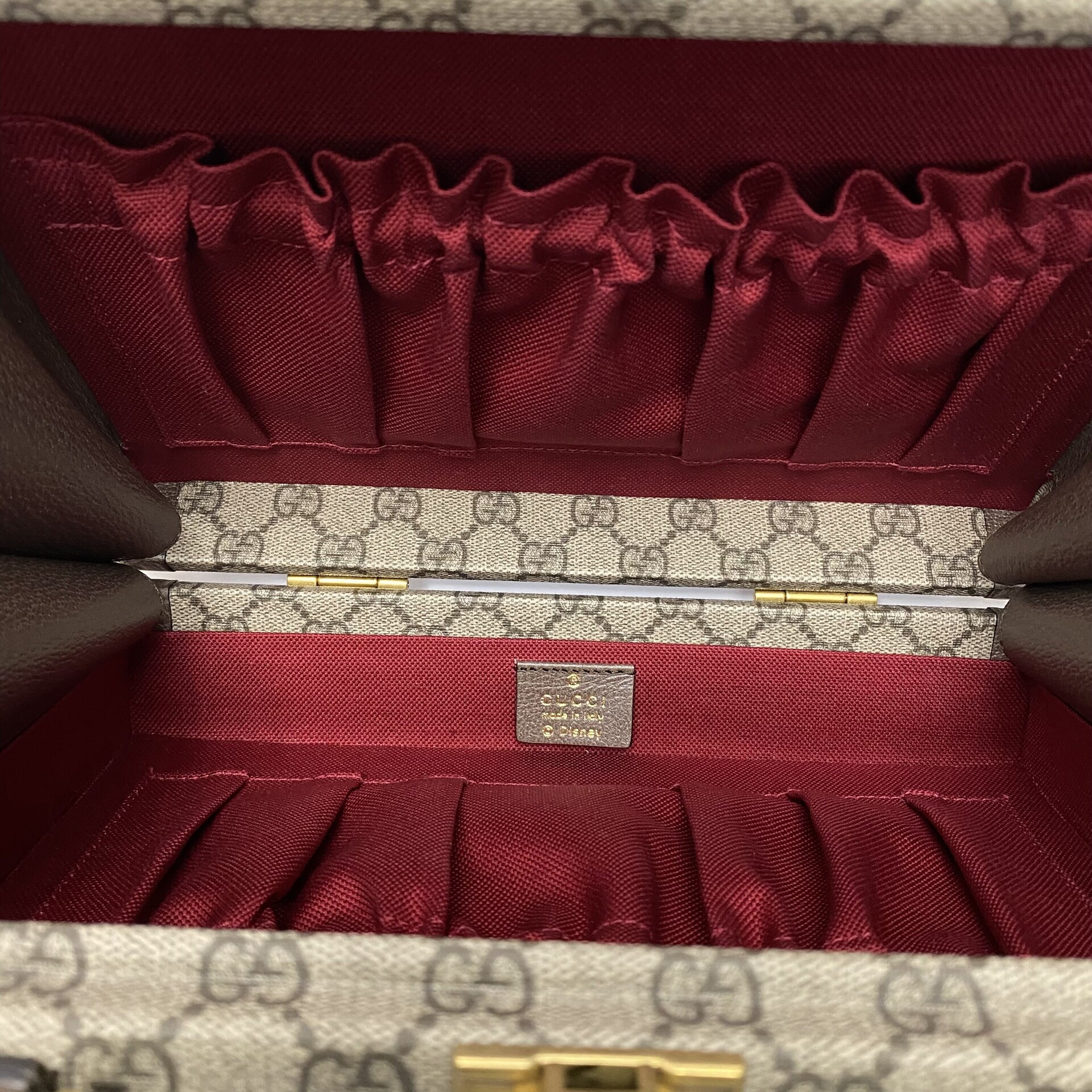 Bolsa Gucci GG Supreme Donald Duck Case Vanity
