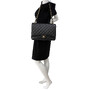Bolsa Chanel Clássica Double Flap Maxi Couro Preta