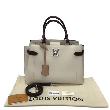 Bolsa Louis Vuitton LockMe Day